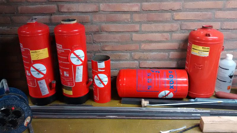 File:Chopped extinguishers.jpg